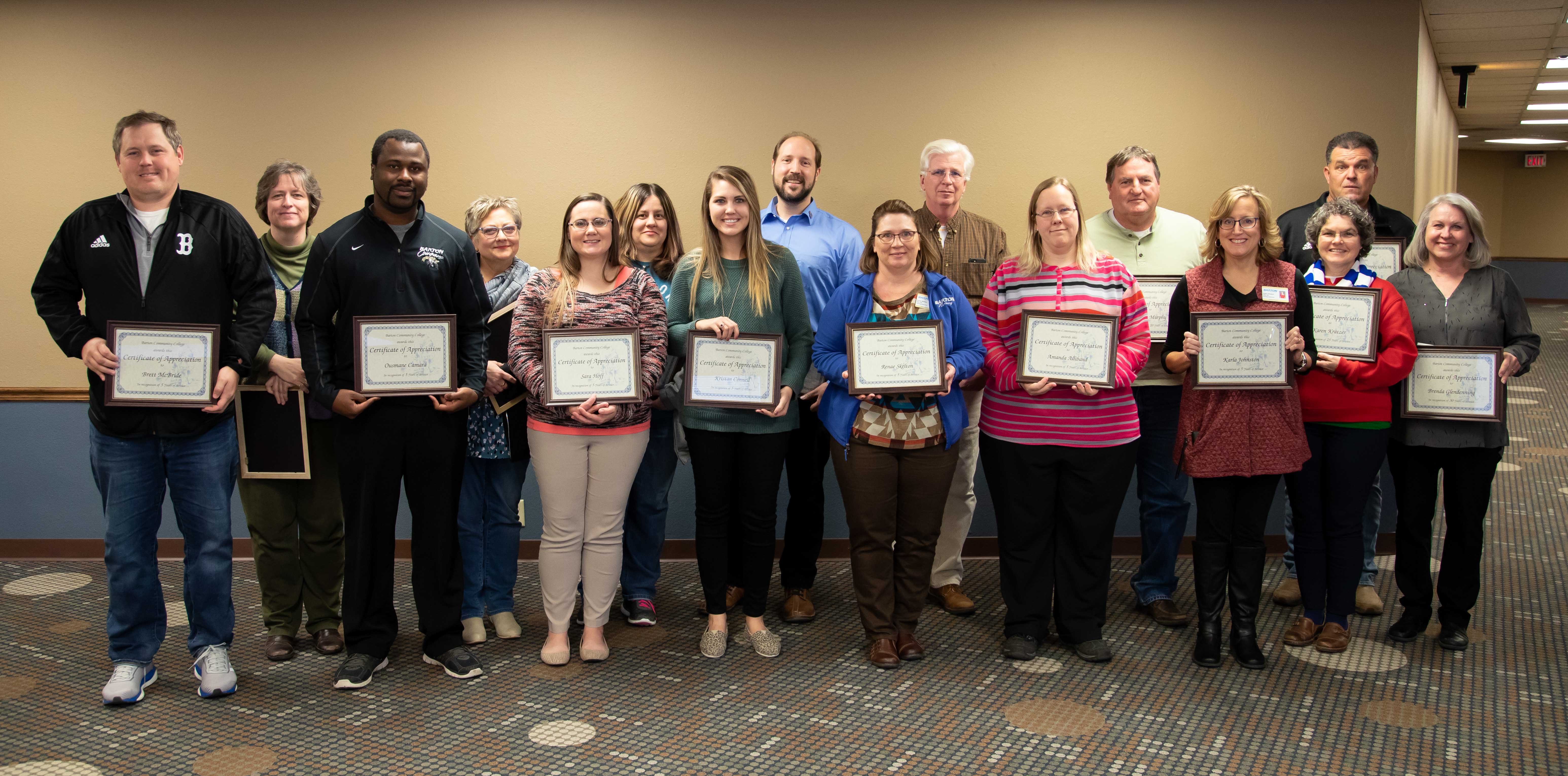 Service Award Recipients stand together.