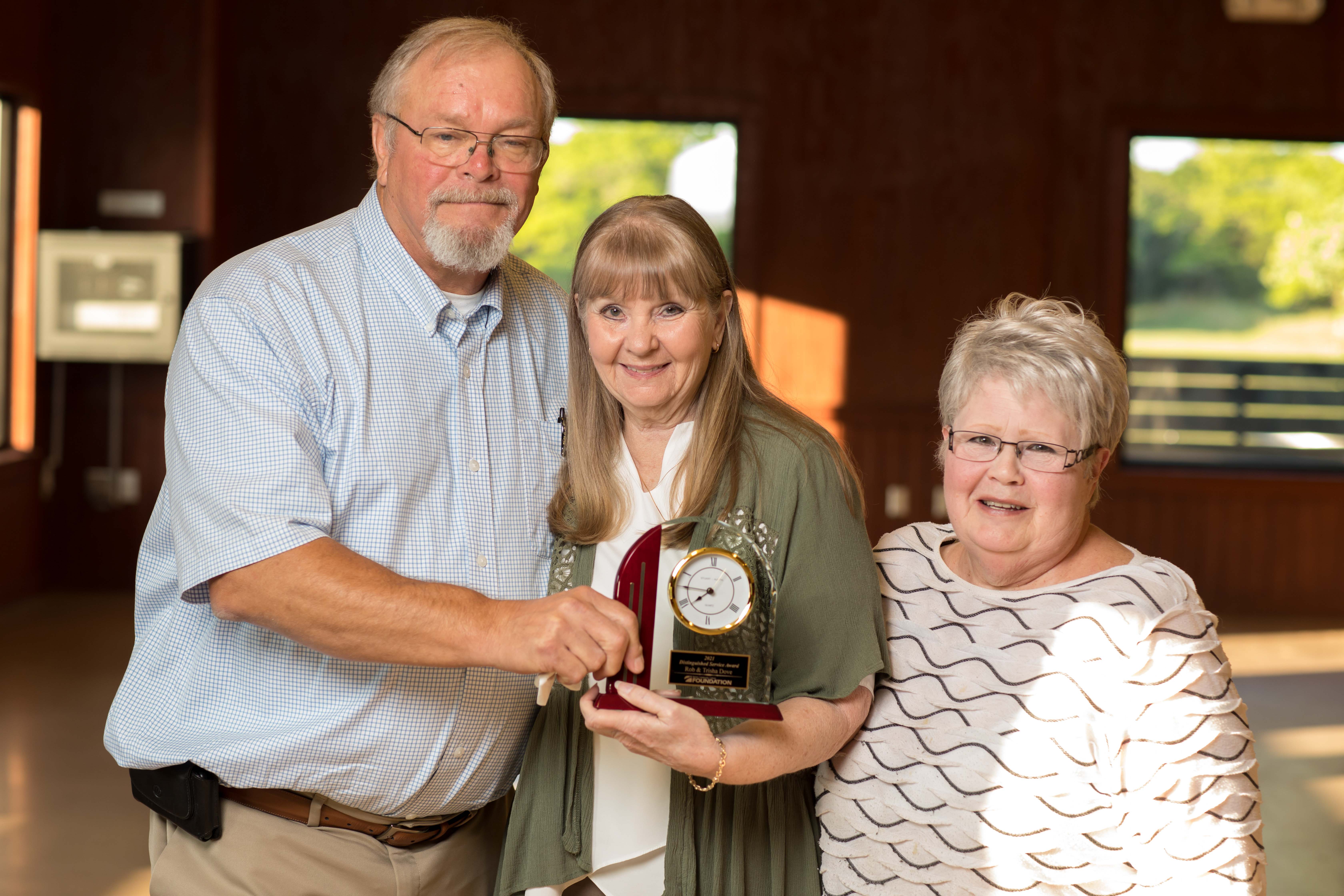 Rob and Trisha Dove pose with Foundation Executive Director Coleen Cape.