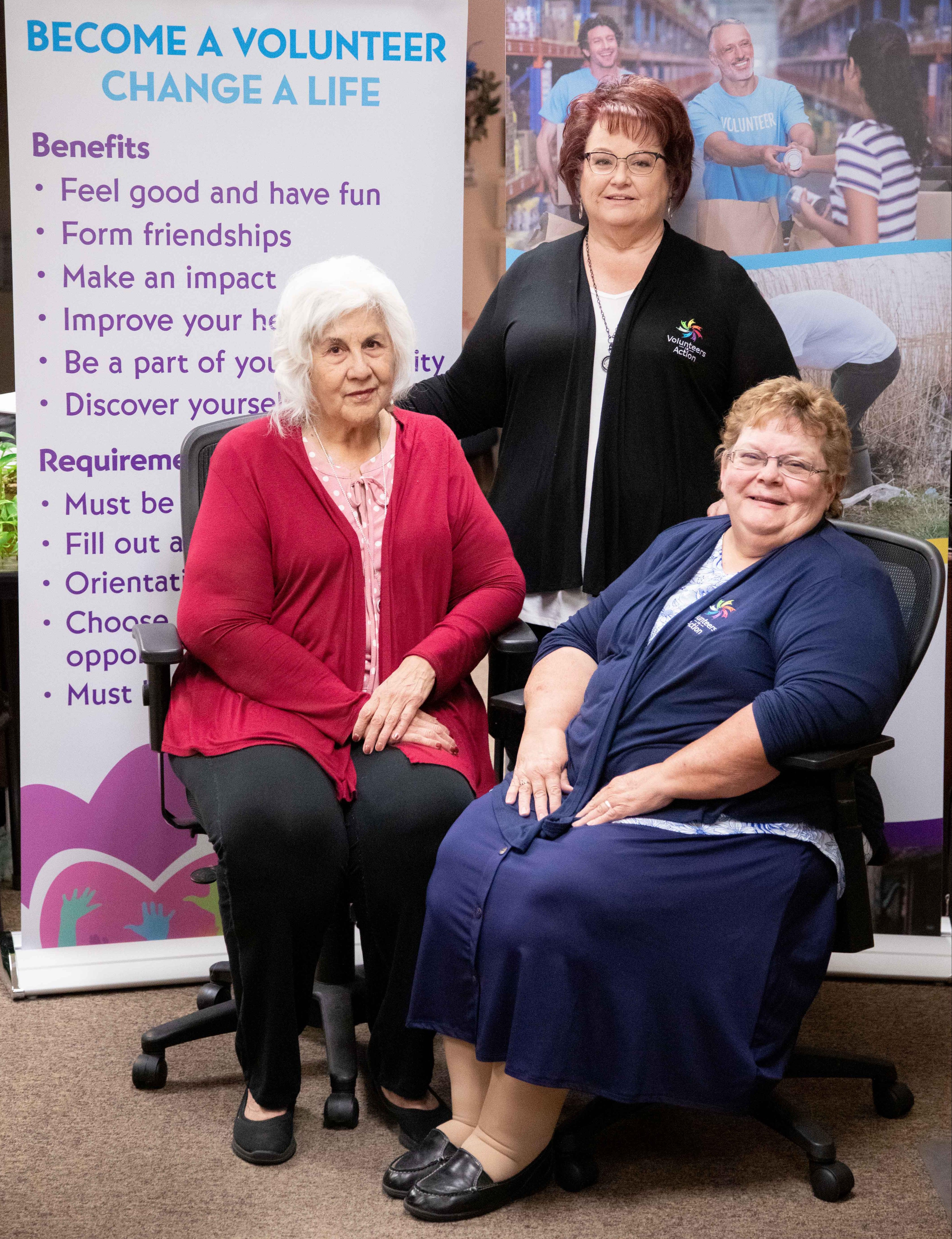 Volunteers In Action (VIA) Administrative Assistant Victoria Garza-Reyes (from left), VIA Director Linn Hogg, and Meals On Wheels Support Staff Susan Gibson pose in the VIA office after receiving the Points of Light Service Enterprise Certification.