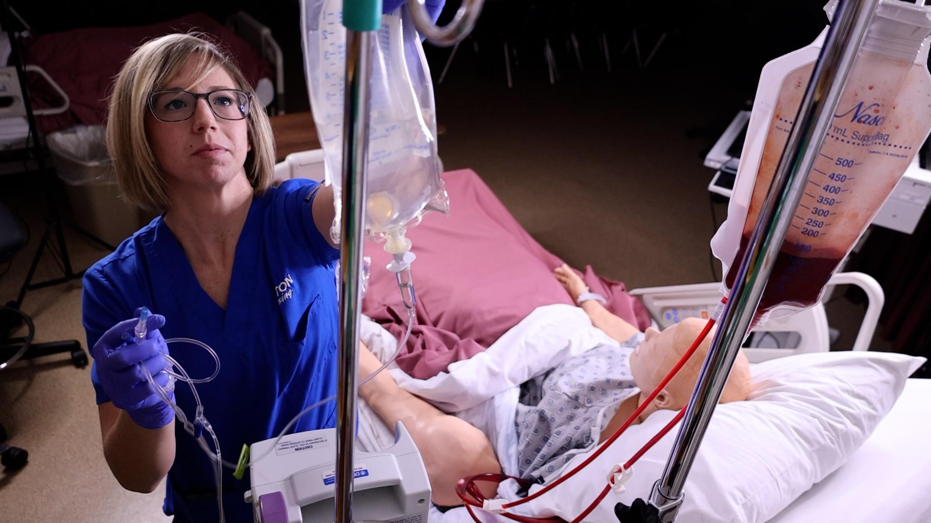 Nurse training on a mannequin