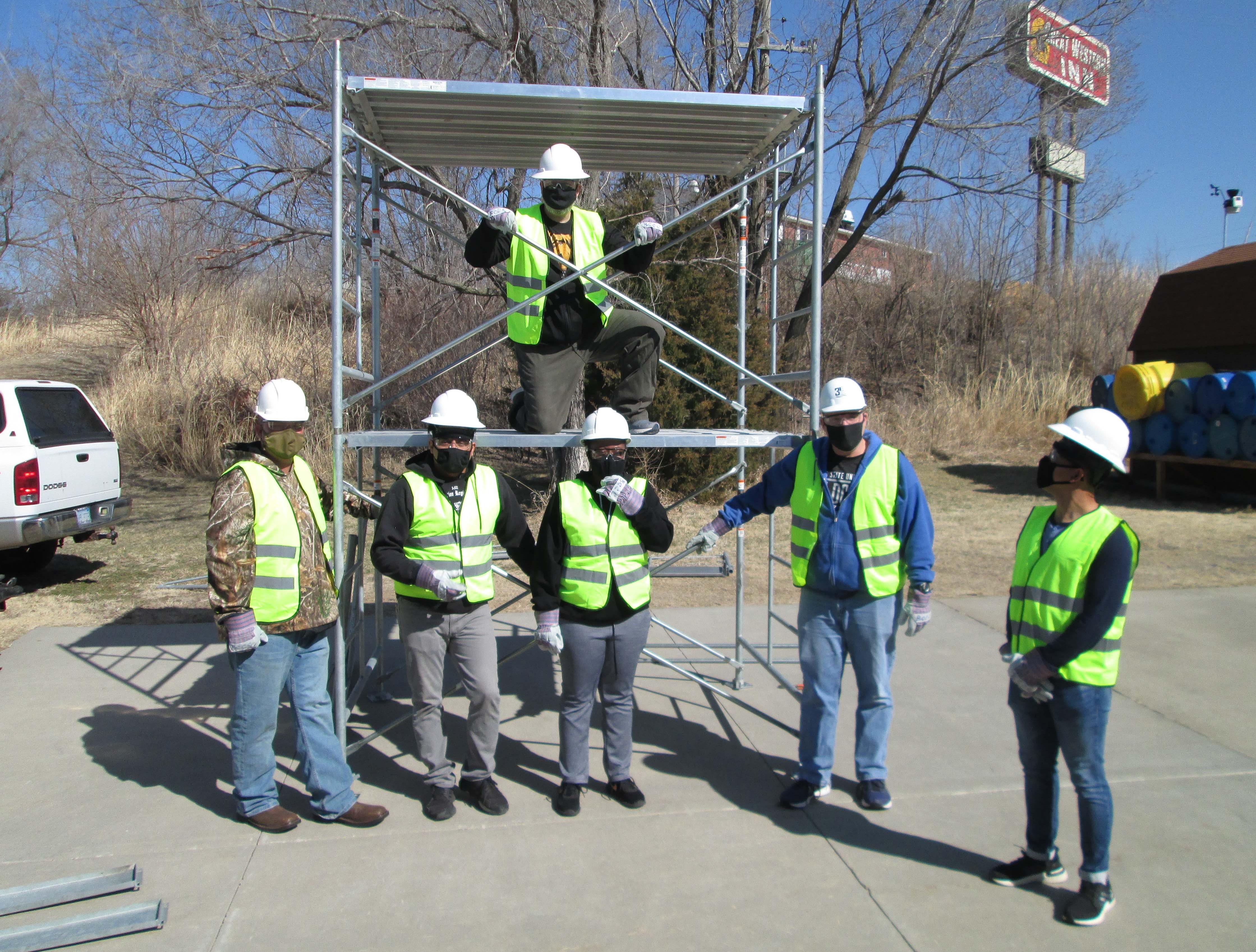 people in safety gear