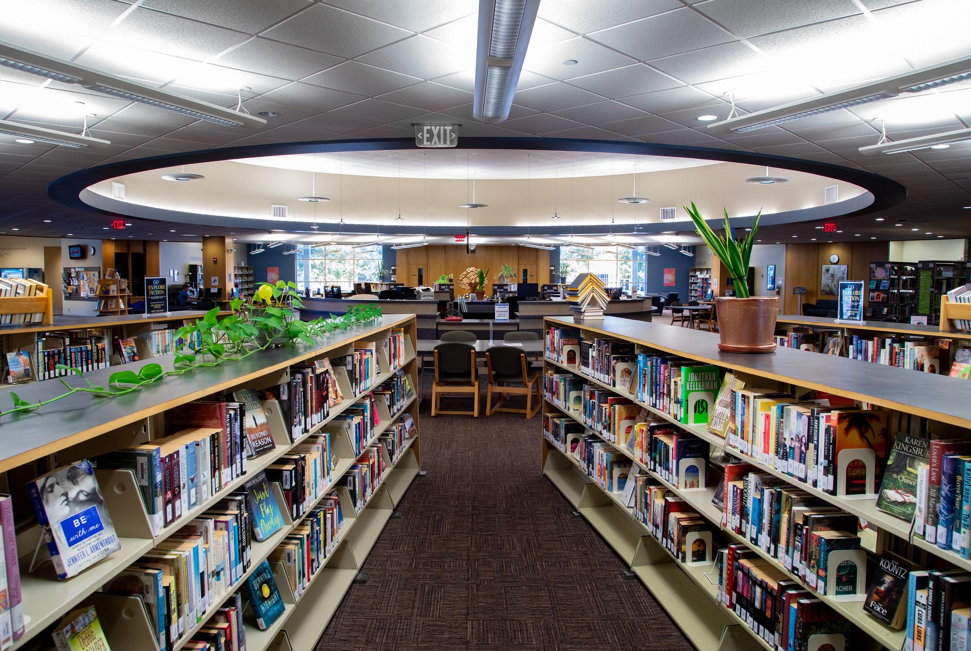 barton library circulation desk and book shelves