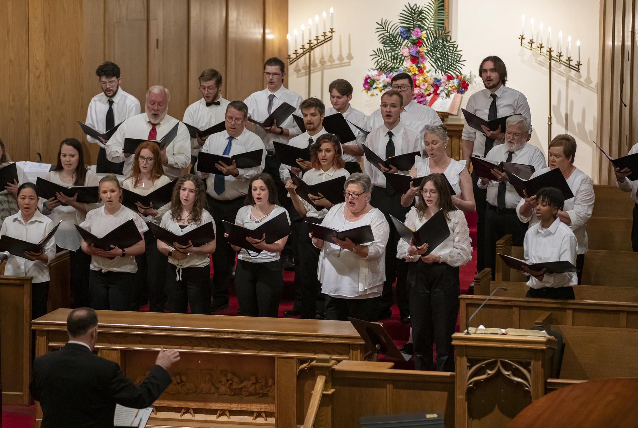 people singing in a choir